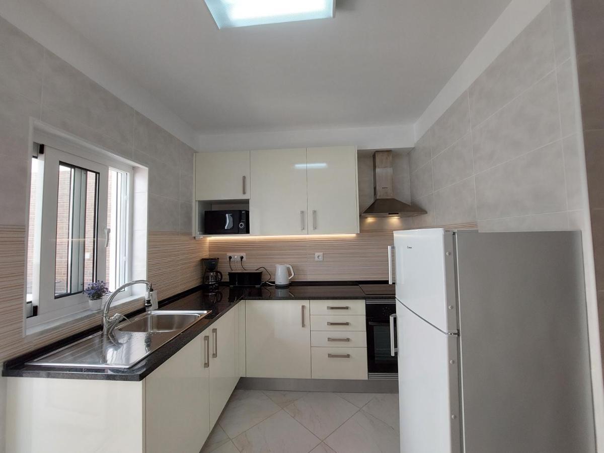 Encosta Do Sol Apartamentos อัลบูเฟรา ภายนอก รูปภาพ